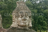 CAMBODIA, Angkor Wat, stone carved face of Hindu God, CAM8JPL