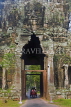 CAMBODIA, Angkor Wat, tuk tuk passing through the east gate, CAM70JPL