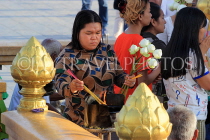 CAMBODIA, Phnom Penh, Sisowath Quay, Dorngkeu Shrine, worshippers, CAM1813JPL