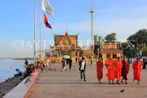 CAMBODIA, Phnom Penh, Sisowath Quay (Riverside Promenade), and monks, CAM1804JPL