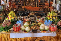 CAMBODIA, Phnom Penh, Wat Phnom, Main Hall, food offerings, CAM1963JPL