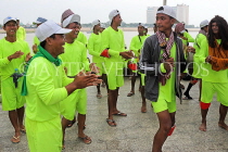 CAMBODIA, Phnom Penh, Water Festival, racing boat oarsmen daning, CAM1618JPL