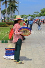 CAMBODIA, Phnom Penh, Water Festival, souvenir hat seller, CAM1879JPL