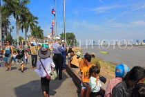 CAMBODIA, Phnom Penh, Water Festival, spectators by Tonle Sap River, CAM1623JPL