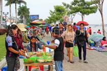 CAMBODIA, Phnom Penh, Water Festival, street food stalls by the riverside, CAM1860JPL