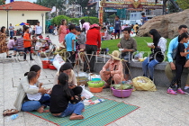 CAMBODIA, Phnom Penh, street food, people enjoying food from vendors, CAM2099JPL