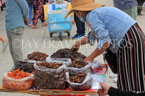 CAMBODIA, Phnom Penh, street food, stall selling fried insects, crickets, grubs, CAM2078JPL