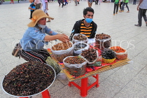 CAMBODIA, Phnom Penh, street food, stall selling fried insects, crickets, grubs, CAM2081JPL
