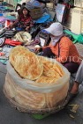 CAMBODIA, Phnom Penh, street food, vendor selling snacks, CAM2090JPL