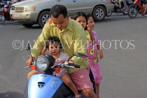CAMBODIA, Phnom Penh, street scene, traffic, four on a scooter, CAM1821JPL