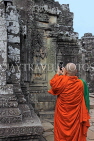 CAMBODIA, Siem Reap, Angkor Thom, Bayon Temple, Buddhist monk taking photo, CAM817JPL