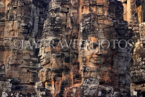 CAMBODIA, Siem Reap, Angkor Thom, Bayon Temple, stone faces, evening light, CAM812JPL
