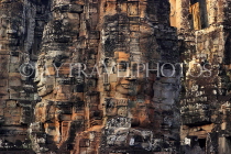 CAMBODIA, Siem Reap, Angkor Thom, Bayon Temple, stone faces, evening light, CAM813JPL