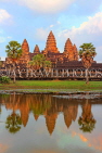 CAMBODIA, Siem Reap, Angkor Wat, and pool reflection, sunset view, CAM469JPL