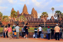 CAMBODIA, Siem Reap, Angkor Wat, and sunset view, tourists gathered to watch, CAM478JPL
