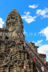 CAMBODIA, Siem Reap, Angkor Wat, tourists climbing to Uppermost Terrace (Bakan), CAM584JPL