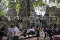 CAMBODIA, Siem Reap, Ta Prohm Temple, tourists at temple site, CAM1467JPL