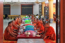 CAMBODIA, Siem Reap, Wat Bo Temple, Prayer Hall, Monks at meal time, CAM2068JPL