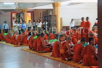 CAMBODIA, Siem Reap, Wat Bo Temple, Prayer Hall, Monks at meal time, CAM2071JPL