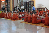 CAMBODIA, Siem Reap, Wat Bo Temple, Prayer Hall, Monks at meal time, CAM2072JPL