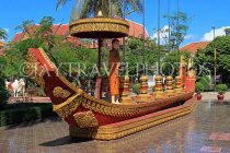 CAMBODIA, Siem Reap, Wat Preah Prom Rath, temple site, replica boat and monk, CAM2125JPL