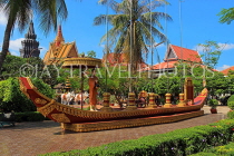 CAMBODIA, Siem Reap, Wat Preah Prom Rath, temple site, replica boat and monk, CAM2126JPL