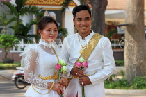 CAMBODIA, Siem Reap, newly wed couple being photographed, CAM2261JPL