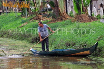 CAMBODIA, Siem Reap, town centre, Siem Reap River,man in small boat, CAM2301JPL