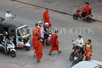 CAMBODIA, Siem Reap, town centre traffic, monks crossing the road, CAM2247JPL