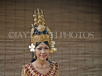 CAMBODIA, Siem Reap, woman posing in traditional dress and headgear, CAM93JPL
