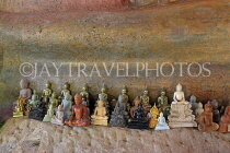 CAMBODIA, Siem Reap Prov, Kulen Mountain, Wat Preah Ang Thom, small Buddha statues, CAM2419JPL