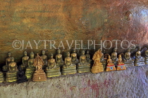 CAMBODIA, Siem Reap Prov, Kulen Mountain, Wat Preah Ang Thom, small Buddha statues, CAM2420JPL