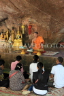 CAMBODIA, Siem Reap Prov, Kulen Mountain, Wat Preah Ang Thom, worshippers, CAM2413JPL
