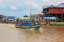 CAMBODIA, Tonle Sap Lake, Kampong Phluk Fishing Village, and tour boat, CAM1342JPL