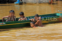 CAMBODIA, Tonle Sap Lake, Kampong Phluk Fishing Village, children playing in lake, CAM1363JPL