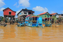 CAMBODIA, Tonle Sap Lake, Kampong Phluk Fishing Village, houses and boats, CAM1276JPL