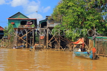 CAMBODIA, Tonle Sap Lake, Kampong Phluk Fishing Village, houses on stilts, CAM1273JPL