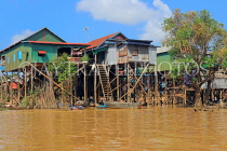 CAMBODIA, Tonle Sap Lake, Kampong Phluk Fishing Village, houses on stilts, CAM1274JPL