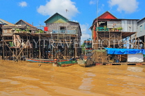CAMBODIA, Tonle Sap Lake, Kampong Phluk Fishing Village, houses on stilts, CAM1279JPL