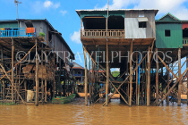 CAMBODIA, Tonle Sap Lake, Kampong Phluk Fishing Village, houses on stilts, CAM1281JPL