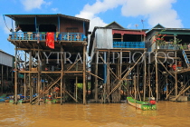 CAMBODIA, Tonle Sap Lake, Kampong Phluk Fishing Village, houses on stilts, CAM1283JPL