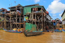 CAMBODIA, Tonle Sap Lake, Kampong Phluk Fishing Village, houses on stilts, CAM1284JPL