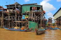 CAMBODIA, Tonle Sap Lake, Kampong Phluk Fishing Village, houses on stilts, CAM1285JPL