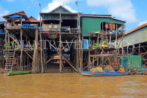CAMBODIA, Tonle Sap Lake, Kampong Phluk Fishing Village, houses on stilts, CAM1286JPL