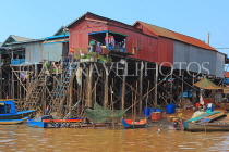 CAMBODIA, Tonle Sap Lake, Kampong Phluk Fishing Village, houses on stilts, CAM1287JPL
