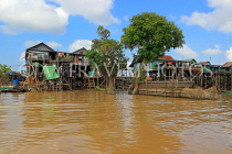 CAMBODIA, Tonle Sap Lake, Kampong Phluk Fishing Village, houses on stilts, CAM1289JPL