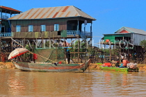 CAMBODIA, Tonle Sap Lake, Kampong Phluk Fishing Village, houses on stilts, CAM1293JPL