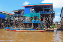 CAMBODIA, Tonle Sap Lake, Kampong Phluk Fishing Village, houses on stilts, CAM1324JPL