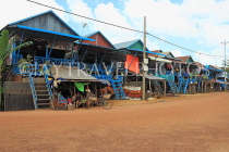 CAMBODIA, Tonle Sap Lake, Kampong Phluk Fishing Village, houses on stilts, CAM1346JPL