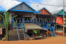 CAMBODIA, Tonle Sap Lake, Kampong Phluk Fishing Village, houses on stilts, CAM1347JPL